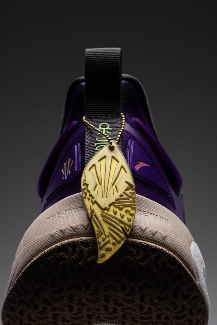 The heel of Kyrie Irving's purple and red ANTA shoe.